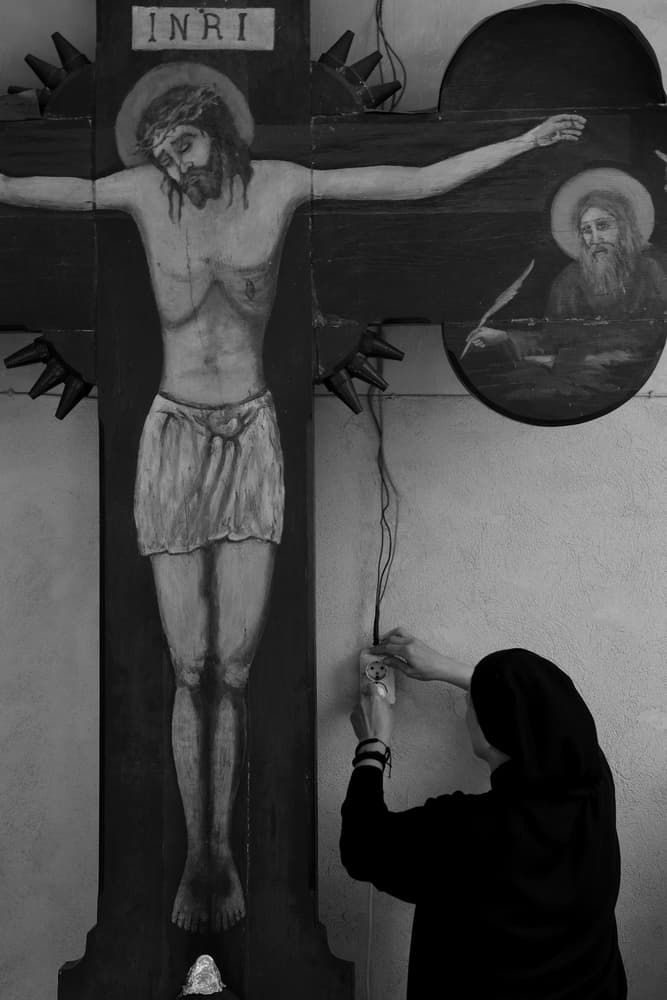 Nun Working on Crucifix by Emilian Avramescu — canvas wall art