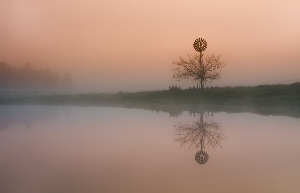 Misty Windmill Reflection by Jingshu Zhu — canvas wall art