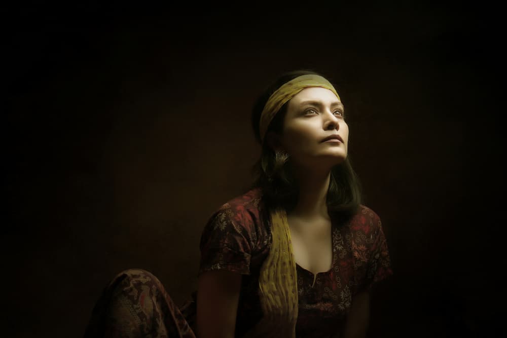 Woman's Upward Gaze by Moein Hasheminasab — canvas wall art