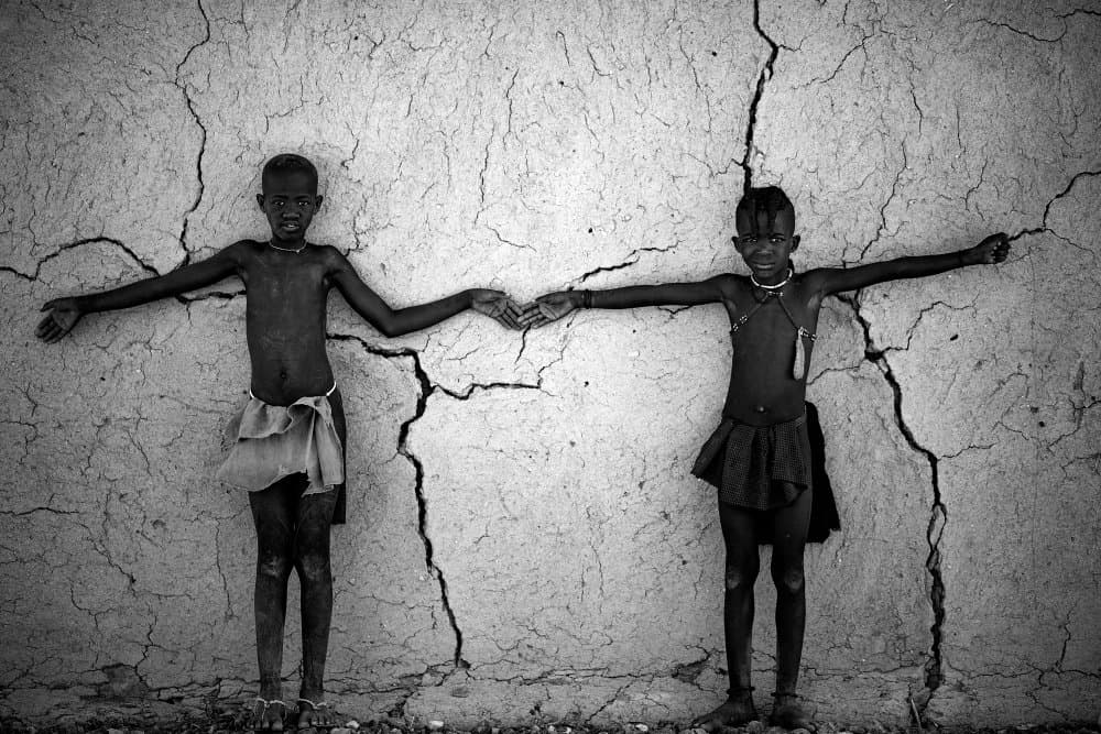 Two Boys Holding Hands by Gina Buliga — canvas wall art