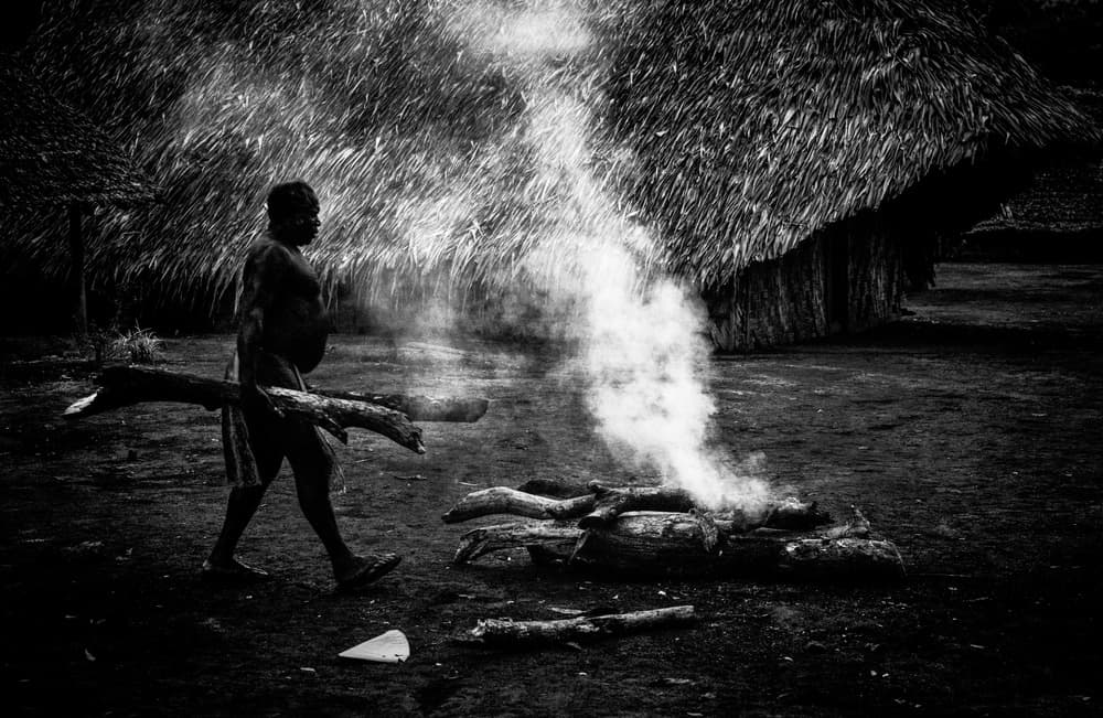 Man Carrying Firewood by Joxe Inazio Kuesta Garmendia — canvas wall art