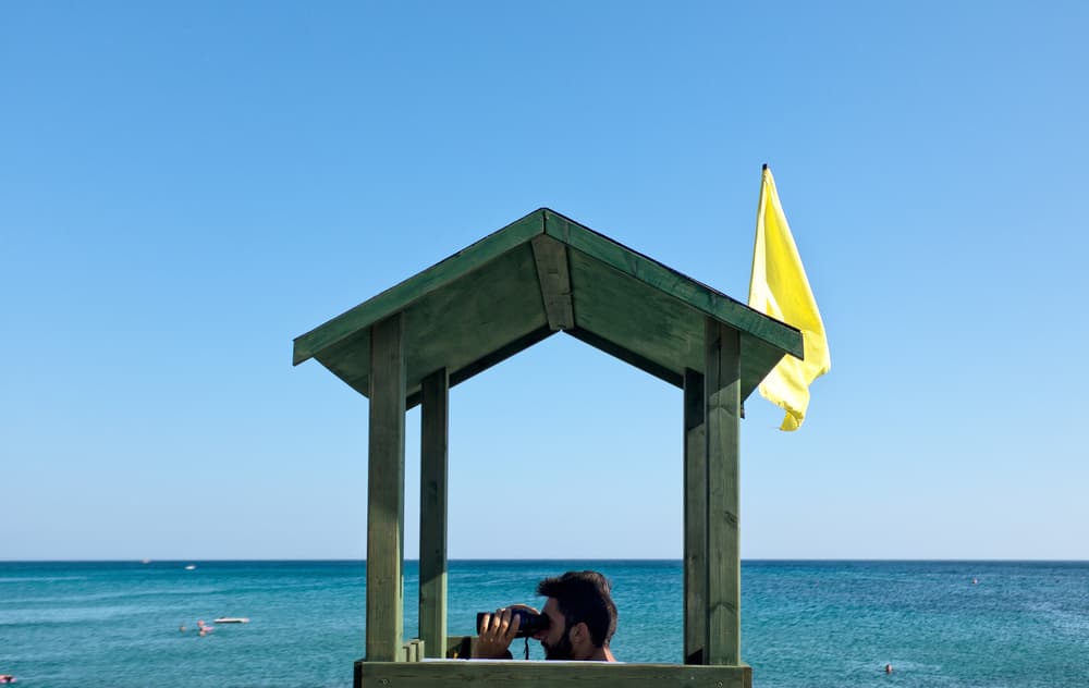 Lifeguard Ocean Watch by Lorenzo Grifantini — canvas wall art