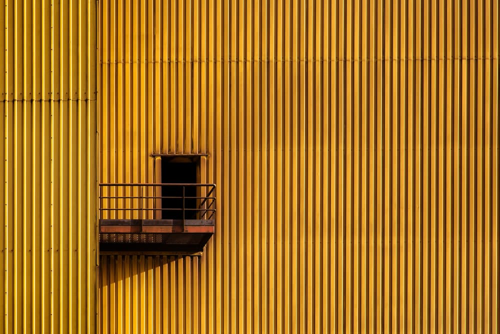 Industrial Yellow Balcony by Linda Wride — canvas wall art